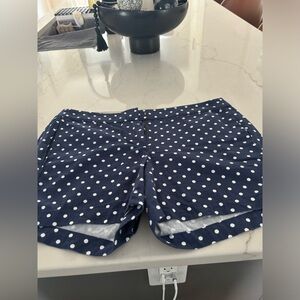 Navy polka dot shorts.